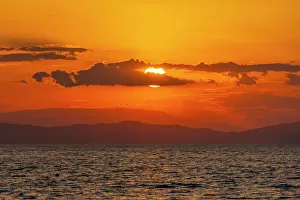 Sea View Prints: View of sunset and Aegean Sea from Thassos Town