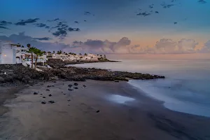 Las Palmas Prints: View of sunset and La Peniita beach