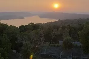 Images Dated 2nd April 2009: View of sunset over Lake Yaxha from Temple 216, Yaxha, Guatemala, Central America