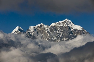 Nepal Prints: A view of Taboche through the clouds seen from Kongde in the Everest region, Nepal