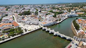 Roads Prints: View of Tavira with its historic buildings and river crossing