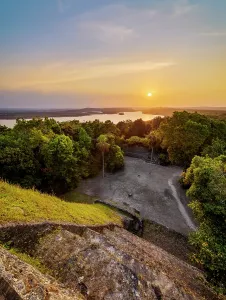Remnants Prints: View from Temple 216 at East Acropolis during sunset with Yaxha Lake in the background in Guatemala