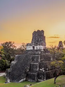 Journeys Prints: View of Temple II at dusk with changing sky colors in Tikal, Peten, Guatemala