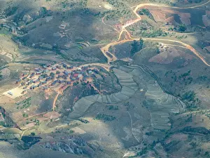 Settlement Prints: View of terraced farmland and rural settlement during charter flight in Madagascar