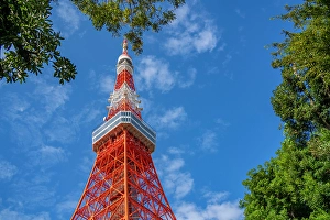 Metallic Prints: View of Tokyo Tower from its base against blue sky