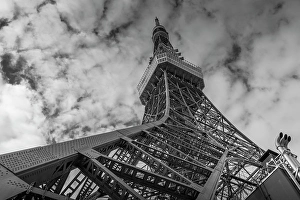 Metalwork Prints: View of Tokyo Tower from its base against cloudy sky