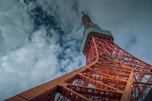 Storytelling Prints: View of Tokyo Tower from its base against cloudy sky
