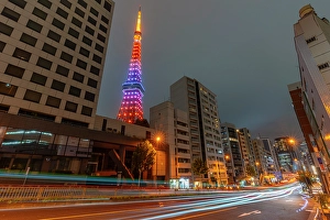 Bustling Prints: View of Tokyo Tower and city buildings at night, Minato City, Tokyo, Honshu, Japan