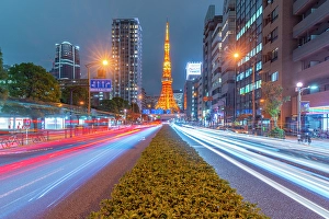 Bustling Prints: View of Tokyo Tower, city street and trail lights at night