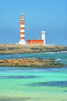 Canary Prints: View of Toston lighthouse near El Cotillo along the coast of Fuerteventura in the Canary Islands