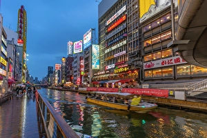 Bustling Prints: View of tour boat and colourful adverts in Dotonbori