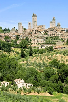 San Gimignano Prints: View to town across agricultural landscape, San Gimignano, UNESCO World Heritage Site