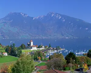 View over town and harbour of Spiez on Lake Thunersee in the Bernese Oberland