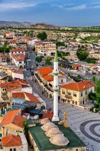 Cappadocia Prints: View of traditional houses and mosque in Ortahisar from castle in Cappadocia Turkey during sunny day