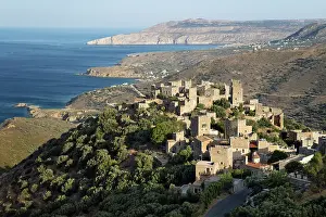 Peloponnese Prints: View over traditional tower houses and Mani coastline behind