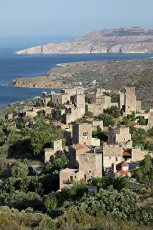 Peloponnese Prints: View over traditional tower houses and Mani coastline behind