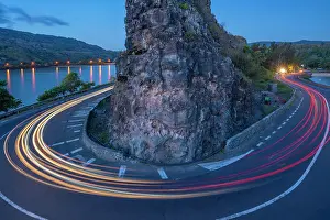 Vehicles Prints: View of trail lights at Baie du Cap from Maconde Viewpoint at dusk