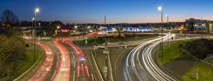 Light Beam Prints: View of trail lights on Hornsbridge Roundabout at dusk