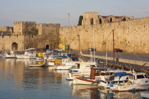 City Walls Prints: View across tranquil Kolona Harbour to the city walls, sunrise, Rhodes Town, Rhodes