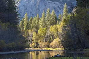 View along the tranquil Merced River below Stoneman Bridge, autumn, Yosemite Village