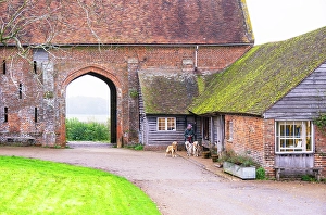 Dogs Prints: View towards Tudor barn in the Sissinghurst Castle Garden, Kent, England, United Kingdom