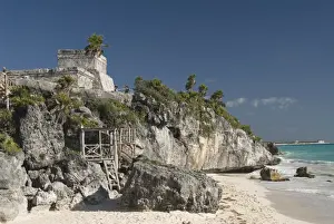 View of Tulum Beach with El Castillo (the Castle) in the Mayan ruins of Tulum in the background