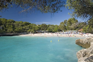 Group Of People Prints: View across the turquoise waters of Cala Mondrago, Parc Natural de Mondrago