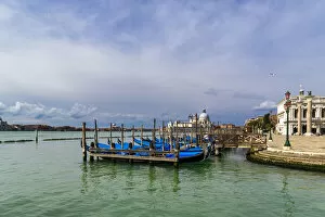 Lagoon Gallery: View of the Venetian lagoon with gondolas moored on the Grand Canal, Riva degli Schiavoni, Venice
