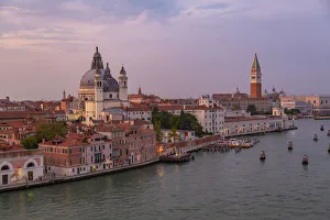 View of Venice skyline from cruise ship at dusk, Venice, UNESCO World Heritage Site