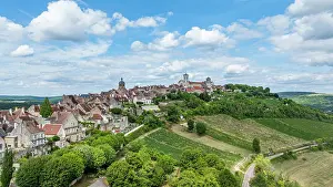 Streets Prints: View of Vezelay hill town and its Abbey in France from above during daytime with sky and clouds