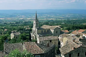 Provence Prints: View over village and church to Luberon countryside, Bonnieux, Vaucluse