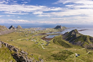Nordland County Gallery: View of village of Sorland framed by green meadows and sea, Vaeroy Island, Nordland county