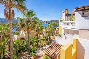 Real Estate Prints: View of villlas overlooking bay at Camp de Mar
