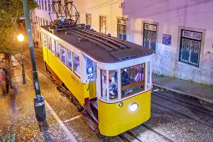 Ride Prints: View of vintage Gloria Funicular at dusk, hilltop tram ride, Lisbon, Portugal, Europe