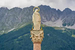 Innsbruck Prints: View of Virgin Mary on Annasule surrounded by mountains in summer in Innsbruck