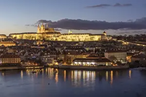 Varying Focus Prints: View of the Vltava River framed by historical buildings at dusk, Prague, Czech Republic