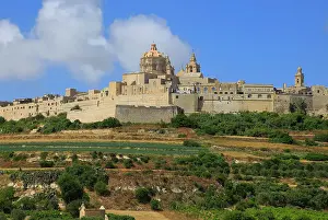 Gozo Prints: View of walled city of Mdina, with dome of Saint Paul's Cathedral under scaffolding