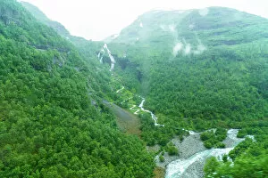 Waterfall Gallery: A view of waterfalls and forest from the Flam Railway, Flamsbana, Flam, Norway, Scandinavia