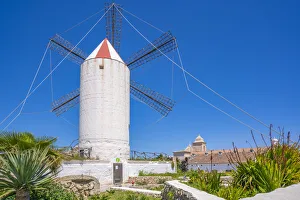 Menorca Prints: View of whitewashed windmill and Tourist Info Centre
