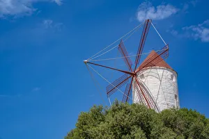 Menorca Prints: View of windmill against blue sky in Es Mercadal