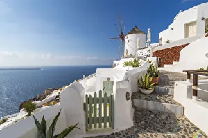 Cyclades Prints: View of windmill overlooking Oia village, Santorini, Aegean Island, Cyclades Island