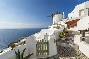 Traditionally Greek Gallery: View of windmill overlooking Oia village, Santorini, Aegean Island, Cyclades Island