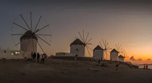 View of the windmills in Mykonos Town at sunset, Mykonos, Cyclades Islands, Greek Islands