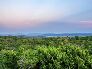 Pyramid Prints: View of Yaxha Lake from Temple 216 at East Acropolis during sunset in Guatemala