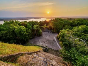 Indigenous Prints: View of Yaxha Lake from Temple 216 at East Acropolis during sunset in Guatemala