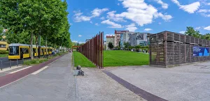 Bernauer Strasse Prints: View of yellow city tram at the Berlin Wall Memorial