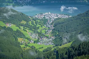 Salzburg Prints: View of Zell am See and surrounding landscape from Schmittenhohebahn top station on a sunny day in Austria
