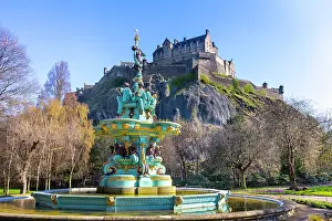 Edinburgh Prints: Viewing Edinburgh Castle from Princes Street Gardens with Ross Fountain in the foreground on a sunny day
