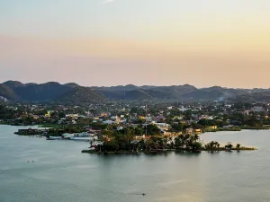 Viewpoint Prints: Views of Lake Peten Itza and San Benito from Mirador Rey Canek during sunset in Flores