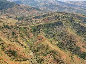 Altitude Prints: Views over the landscape of Madagascar during a charter flight from Antanavarino to Fianarantsoa International Airport